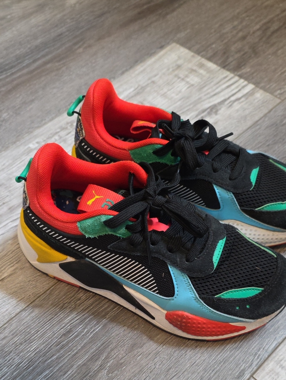 Puma Kids Black Sneakers with Red, Teal & Yellow Accents